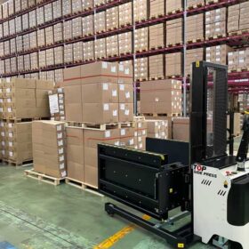 Close-up of a layer picker attachment on a forklift